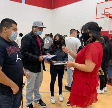 People interacting at a school event