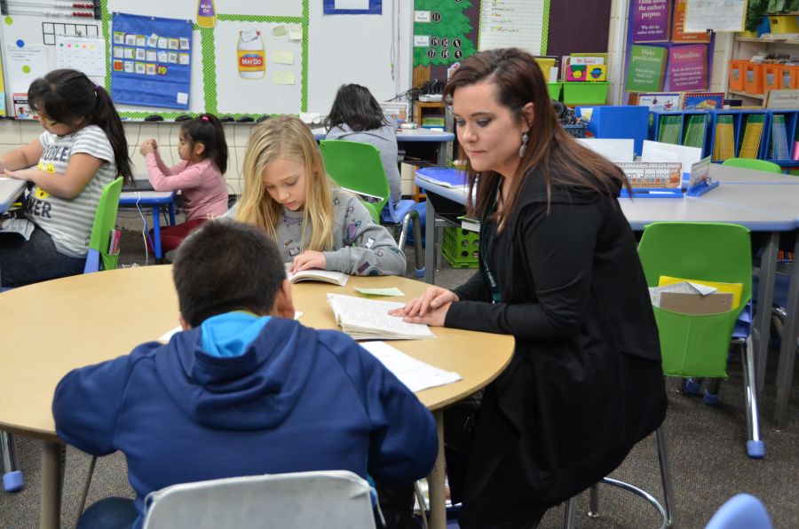 Teacher with students in classroom